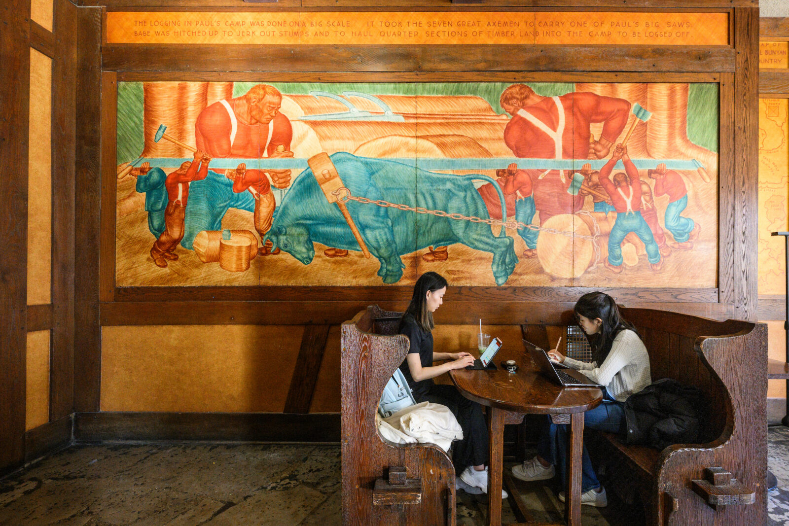 “Paul Bunyan Murals” by James Watrous are seen in the Bunyan Room on the first floor of Memorial Union