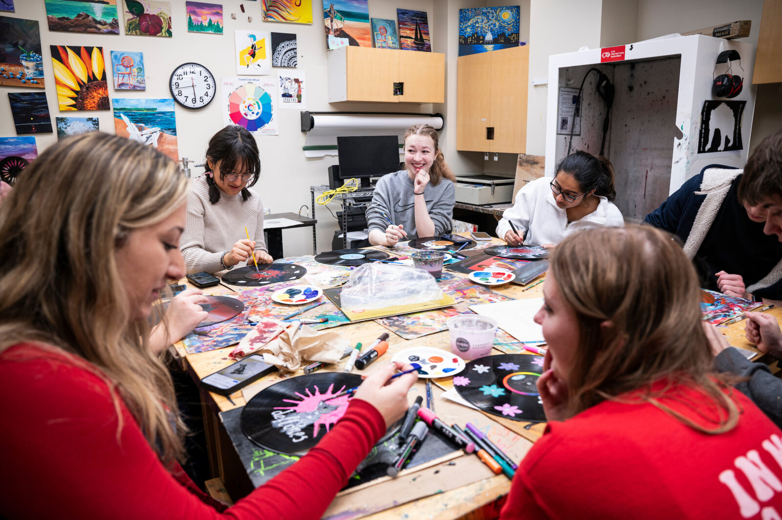Students express their creativity together during the Free Art Friday: Painted Vinyl Records event at Memorial Union