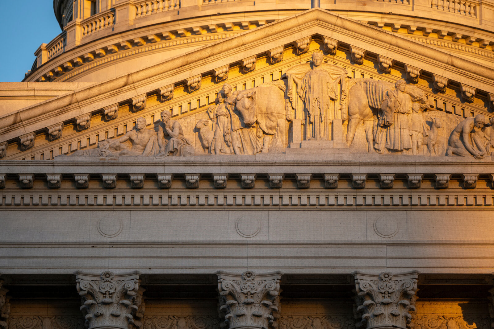 Sunset light shines on the dome of the Wisconsin State Capitol building near the University of Wisconsin–Madison campus during autumn on Oct. 17, 2024. (Photo by Jeff Miller / UW–Madison)